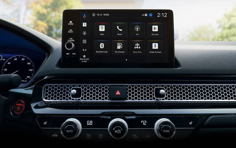 2026 Honda Civic Hatchback Sport Touring Hybrid dashboard with screen displaying Apple CarPlay (Compact Hatchback). 2026 Honda Civic Hatchback Sport Touring Hybrid dashboard with screen displaying Apple CarPlay (Compact Hatchback).